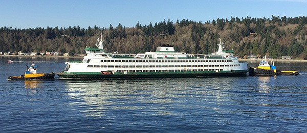 The Tacoma being towed to dock for trials.