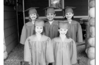 The 2009 kindergarten graduates from the Cottage Montessori School in Silverdale are (back row