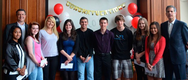 Nine of the 14 recipients of scholarships from Kitsap Bank celebrated with bank officials recently. The awards are made to children of Kitsap Bank employees who have graduated from high school and are seeking higher education.