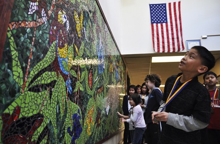 Woodlands Elementary mosaic unveils wildcat in school entrance