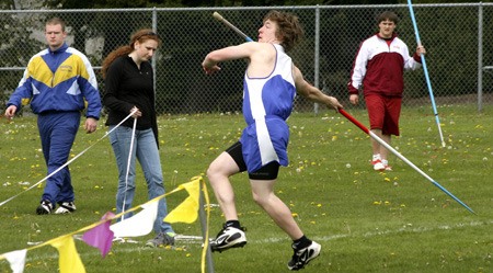 Olympic High School competes in the javelin throw last week. The track and field postseason continues this weekend with sub-districts.