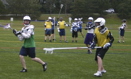 The North Kitsap boys high school lacrosse team practices at Strawberry Fields in Poulsbo.