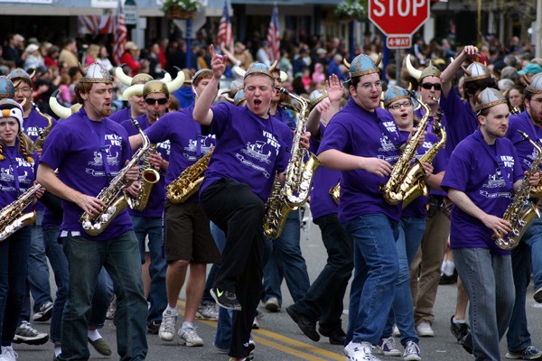 The University of Washington Huskies Saxophone Band is exuberant during the 2011 Viking Days Parade