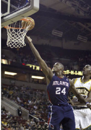 Marvin Williams goes for a layup during his final game at Key Arena Jan. 25.