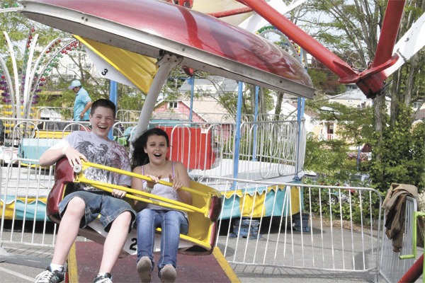 A ride at Poulsbo’s Viking Fest  carnival gives riders a thrill