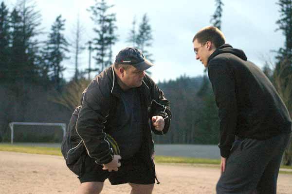 Ron Peterson awaits drill instruction from Deane Shepard at Pendergast Regional Park.