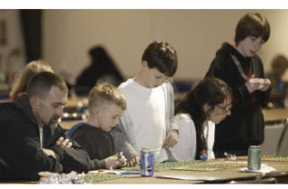 Families keep a close eye on their bingo cards during last year’s Central Kitsap Family Night.