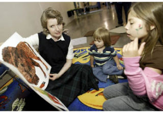 KRL Silverdale Branch Librarian Amanda Cane reads a book to children at last year’s event.
