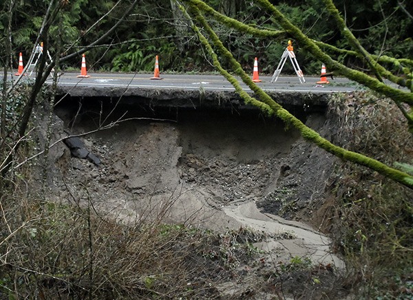 Heavy rain eroded the slope under a portion of Indianola Road at Evergreen Avenue in Indianola on Jan. 11. The county Public Works Department reduced traffic to one lane that day