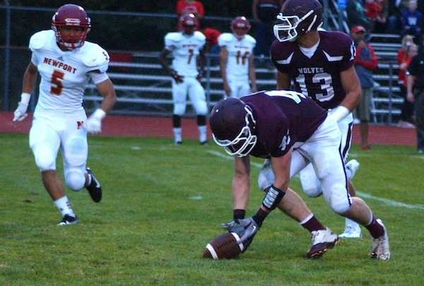 South Kitsap junior Ramon Marin picks up the ball after he blocked a Newport punt and returned it to the Knights’ 1-yard line during first-quarter action on Sept. 13 at home.