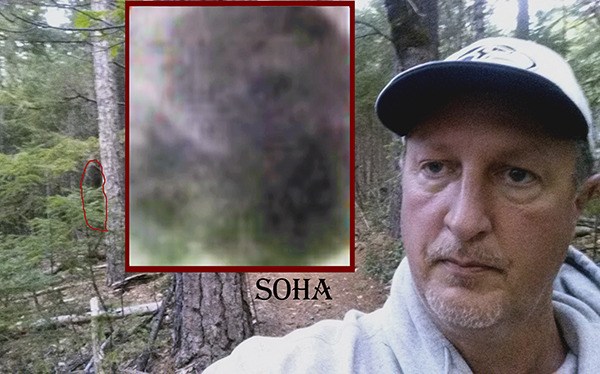 Matthew “Dr. J” Johnson photographs himself with what he says is Bigfoot at the Southern Oregon Habituation Area (SOHA). The photo allegedly shows the hairline