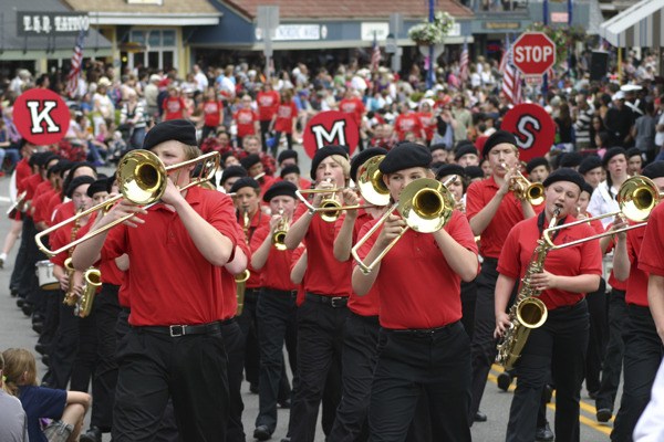 The Kingston Middle School Marching Band performs in the Viking Fest Parade