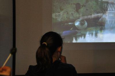 A teen watches Benny & Joon at Port Orchard Library's Teen Cine-Rama