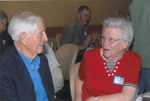 1942 NKHS classmates Harold Beebe of Seattle and June Virkelyst Brieland of Poulsbo catch up during their class reunion.