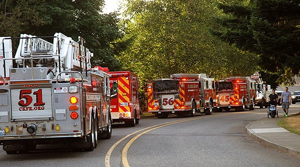 CKFR apparatus line up on a Silverdale area street while responding to a fire this summer.