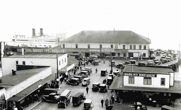 A 1913 photo of the Bremerton Port’s wharf  shows where it all began. The Port of Bremerton is celebrating 100 years with a public open house Saturday.