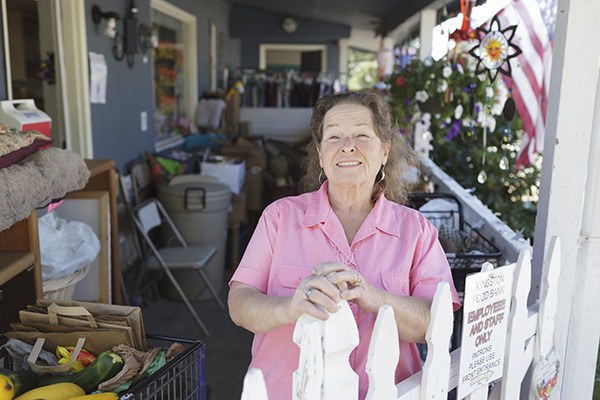 Kingston Food Bank director Barb Fulton stands outside the Illinois Avenue building that will continue to be rented by the food bank