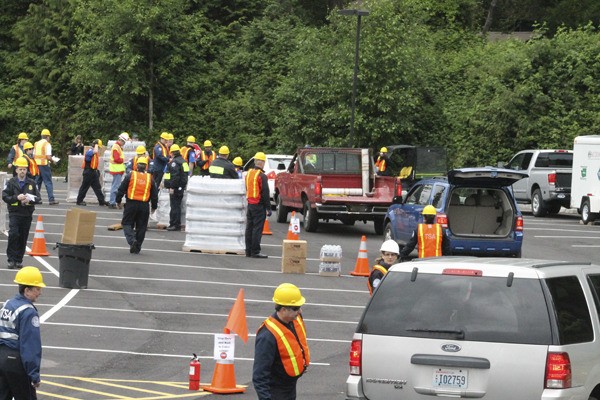 TSA agents ran a mock disaster relief simulation in the parking lot of Suquamish’s House of Awakened Culture Thursday. The Tribe is partnering with Homeland Security