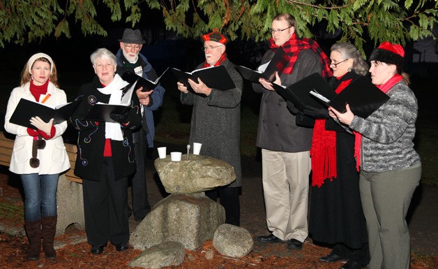 Carolers set the holiday mood at a previous Old Mill Town celebration in Seabeck.