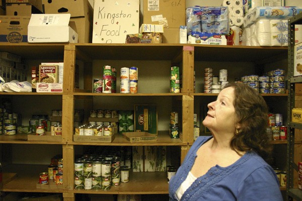 Barb Fulton looks at the shelves of the Kingston Food Bank.