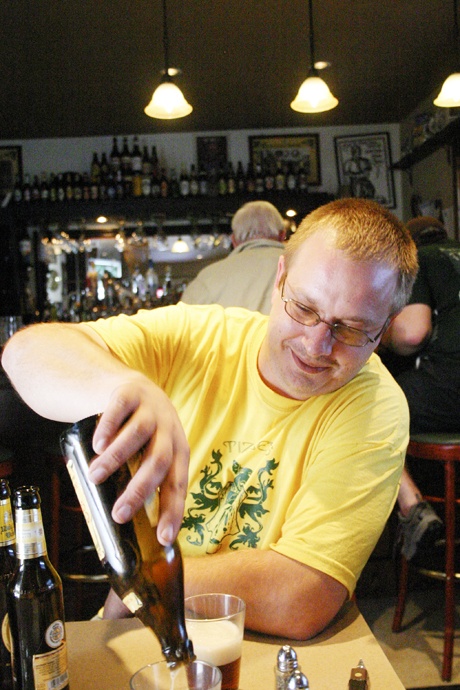 Tizley's Europub co-owner Rob Defillipo pours the last of the rauchbier.