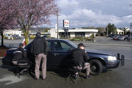 Kitsap County sheriff's deputies surround KeyBank on Silverdale Way Thursday afternoon. There was an attempted robbery with a potential bomb threat.