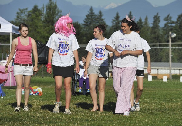 Participants in the 2010 Relay For Life begin their walk. More than 20 teams and 115 individuals are signed up for this year’s event