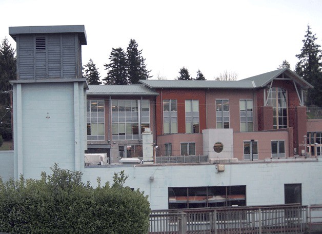 Poulsbo's former city hall building lies in the shadow of its successor. The city currently has plans to demolish the building. The Port of Poulsbo is currently considering purchasing the property for a variety of ideas