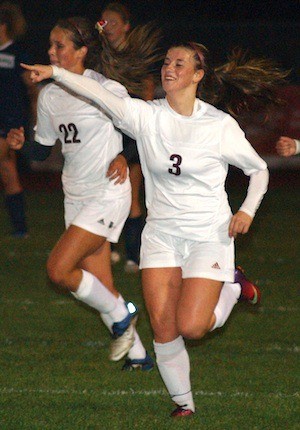 Junior Rachael Prince celebrates after scoring the game-tying goal in the 59th minute in the 2-2 tie with Olympia in Class 4A Narrows League match on Sept. 24.