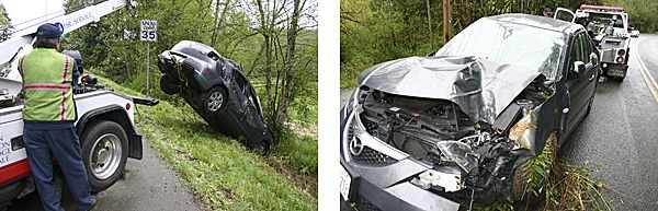 A Mazda 3 compact car crashed into a tree on a steep slope on Bond Road