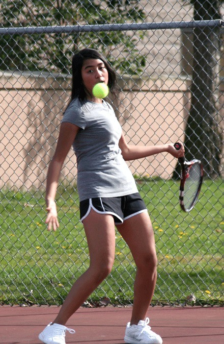 Bremerton High School sophomore Bre Casias hits a forehand during practice Tuesday. The left-hander is the Lady Knights’ No. 1 singles player.