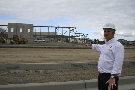 Haselwood Family YMCA Executive Director Geoff Ball points out where the facility’s fitness center will be located Oct. 8.