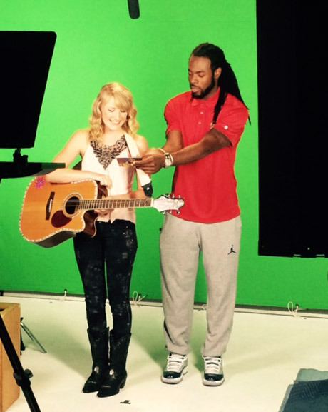 Afton Prater with Richard Sherman.