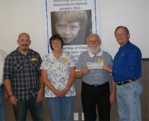 Kitsap Rescue Mission Executive Director Walt Le Couteur receives a $9