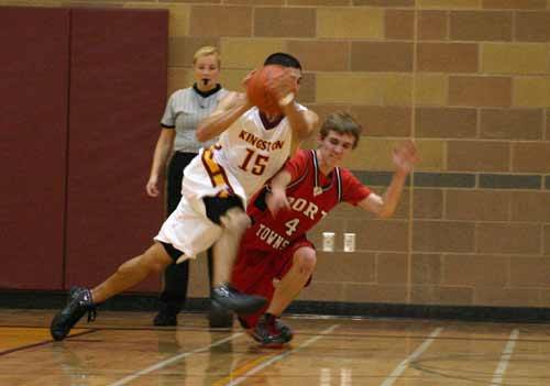 Kingston's George Hill bursts past a defending Port Townsend player during a home game on Jan. 25.