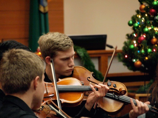 The Bremerton Youth Symphony Youth Orchestra performed at Poulsbo city hall following the final City Council meeting of the year on Dec. 18.