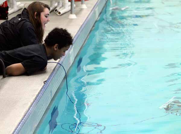 Students from Kingston Middle School were able to try their hand in the Remote Operated Vehicle demonstration and competition April 20 in the North Kitsap Community Pool.