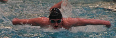 Olympic High School senior swimmer John Wojtech swims the butterfly during a practice Monday. He will compete at state next month.