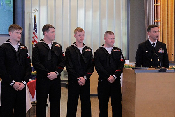 From left to right: Petty officers second class Kory Wilson