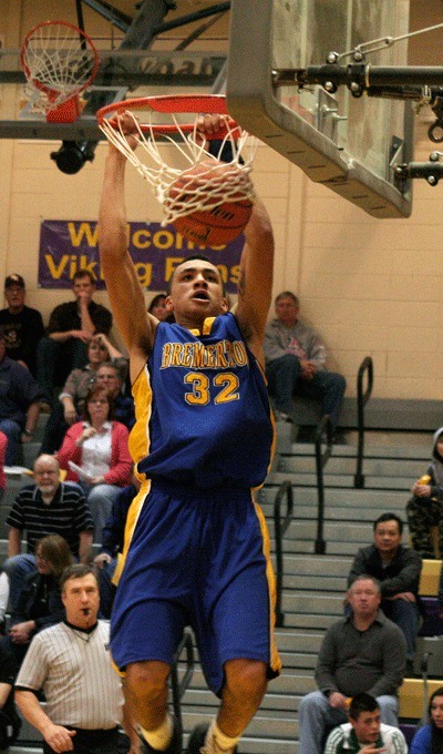 Bremerton High School’s Jarell Flora dunks Tuesday against North Kitsap in the Knights' 79-67