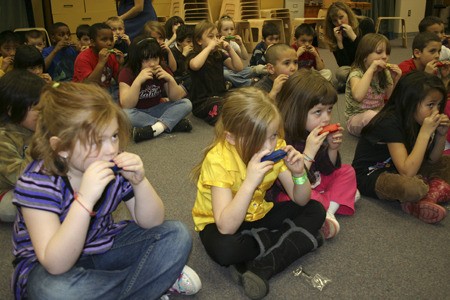 West Hills Elementary kindergartners follow instructions on how to play “Twinkle