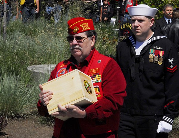 Sam Martin carries Army veteran James Allen Lewis Jr.’s remains