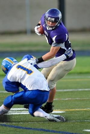 The North Kitsap Vikings could not hold their ground during the first game of the season against rival team Bainbridge Island Spartans.