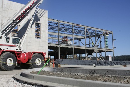 Construction on the Haselwood Family YMCA continues Wednesday in Silverdale. Kitsap Regional Library officials had plans to build and operate a new branch next to the YMCA but with the library levy rejected by voters those plans will have to be revised.