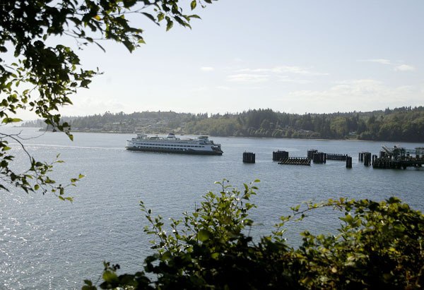 A Washington State ferry approaches the Kingston ferry dock. WSF has a plan to convert its ferry fleet to liquid natural gas