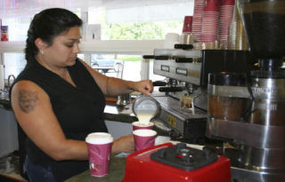 Picnic in the Park owner Tanya Picinich makes drinks at the espresso bar. Picinich opened Picnic in the Park in April in the former Pepe’s Deli location on Silverdale Way.