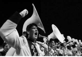 North Kitsap sousaphone player Scott Breitbarch cheers the Vikings’ football team in their game against the  Bremerton Knights at Poulsbo on Oct. 17.