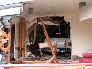 A white Ford F-150 pickup crashed into the sanctuary of Our Saviour's Lutheran Church on the corner of 11th and Veneta Avenue in Bremerton Wednesday morning.