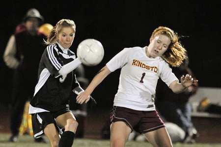 Kingston forward Jaime Schultz battles for the ball with Klahowya’s Rebekka Schell Tuesday at Buccaneer Field. Kingston lost the match