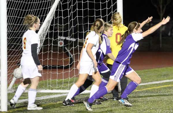 North Kitsap's Abbie Wright and the Vikings celebrate the first of two goals during the soccer game against the Kingston Buccaneers Oct. 23 at Buc Field.